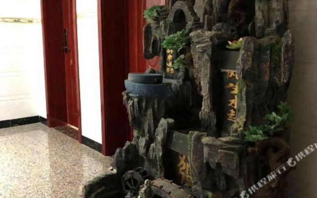 Qujing Aishang Hotel