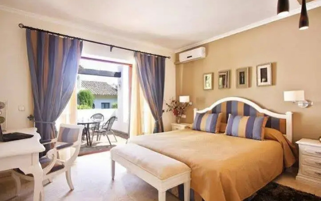 The Suites At San Roque Club