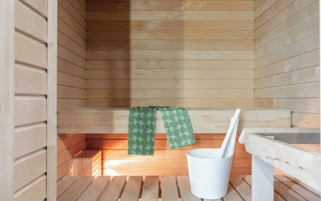 Modern 1BR Home with Sauna & Balcony