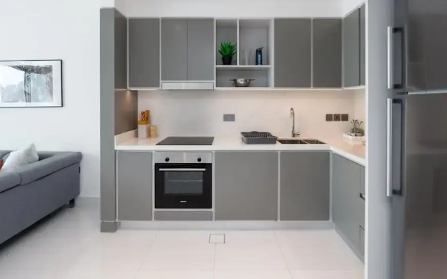 Elegant 2BR Emaar Beachfront Retreat