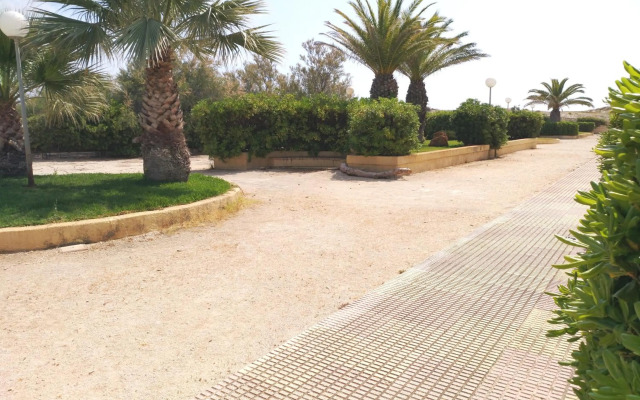 Residencial OlivalAcceso privado playa por jardín