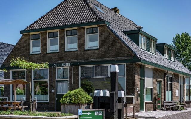 Quaint Holiday Home in Friesland by the Lake