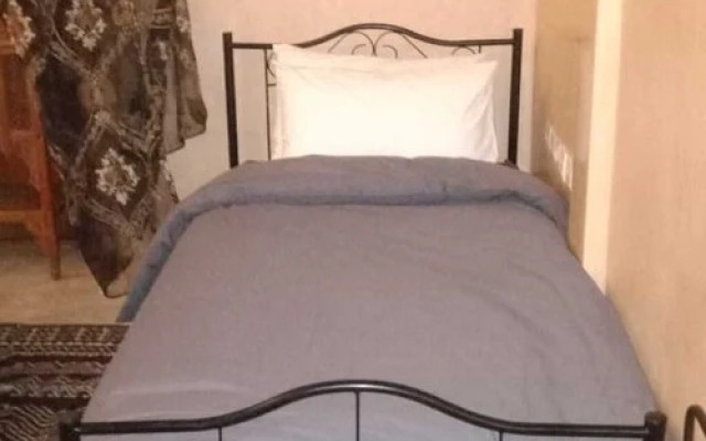 "room in Guest Room - Riad Lakouas Triple Room With Pool View"