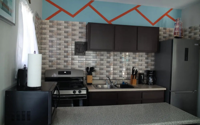 Tropical Breeze Escapes Couples Studio