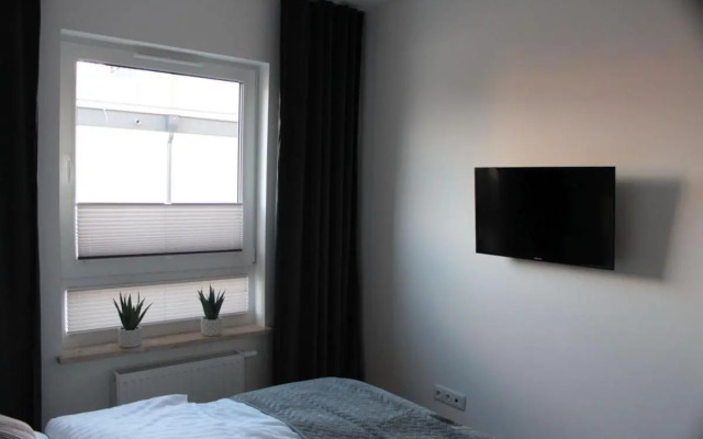 Apartament Wspólna19 (Centrum, garaż podziemny, klimatyzacja )