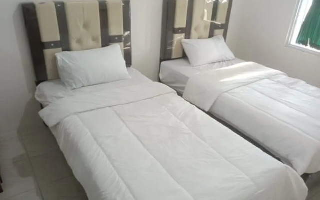 SPOT ON 92515 Timoti Guest House