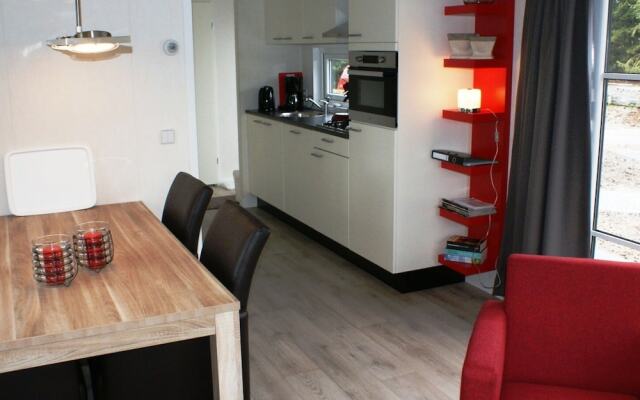 Modern chalet with two terraces and near a pond