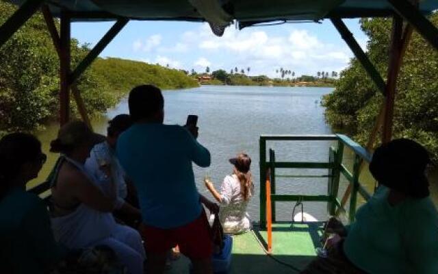 Suíte beira rio 85m praia