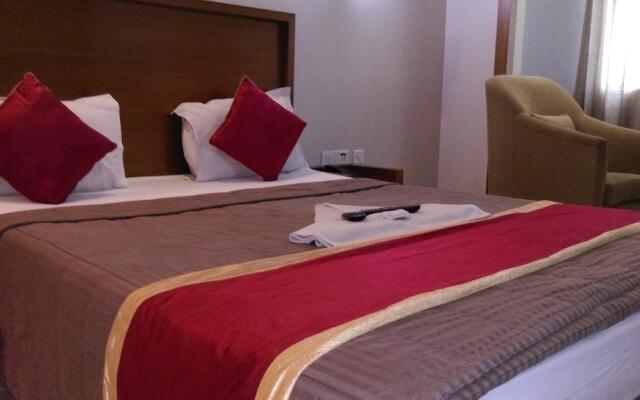 GreenWood Inn & Suites