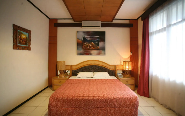 Puri Naga Beachfront Cottages