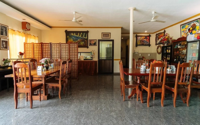 Reddoorz Premium Near Pristine Beach