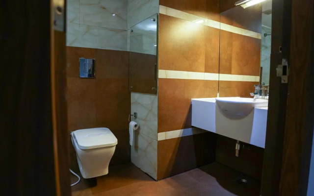 Capital O 27703 Welcare Emarald