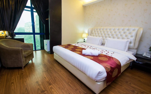 Capital O 91074 Grand World Hotel