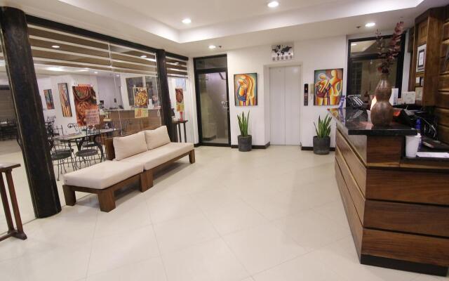 OYO 103 Artina Suites Hotel