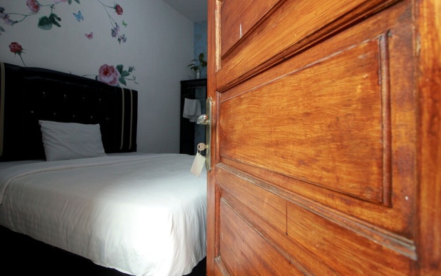 Hotel O Wisma Ria – Guest Rooms – Lubuklinggau