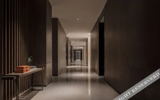 New Beacon Yunman Internation Hotel (Yingshan Tourist Center Chaxiang Small Town)