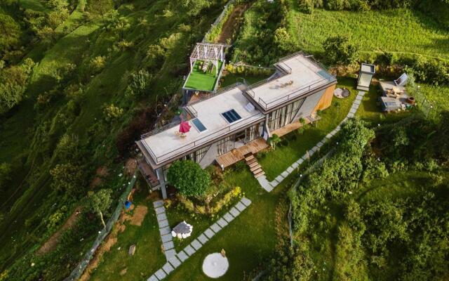 SaffronStays Glasshouse Celeste Ranikhet luxurious glass villa with breathtaking views All clear roads