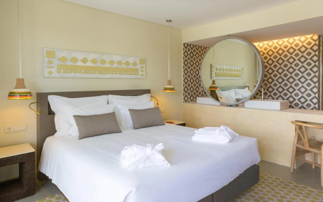 Ozadi Tavira Hotel