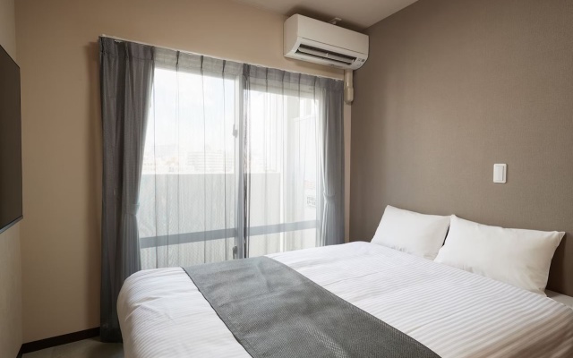 New Normal Hotel in MATSUYAMA – Guest Rooms – Naha