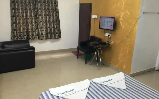 New Victory Mansion & Lodging by OYO Rooms