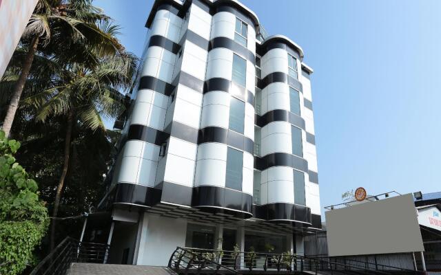 Capital O 10611 Hotel Malabar Illam