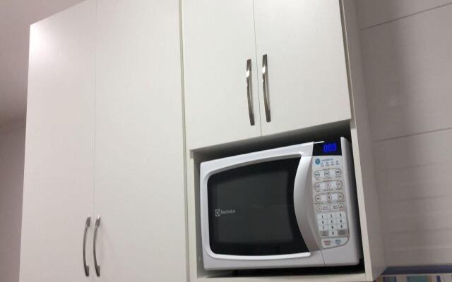 Moderno Estúdio 50m do mar com garagem e Wi-Fi