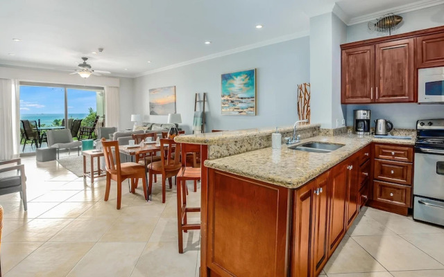 Elegant Oceanview Condo with Spacious Open-Concept Floor Plan and Inviting Beach Design