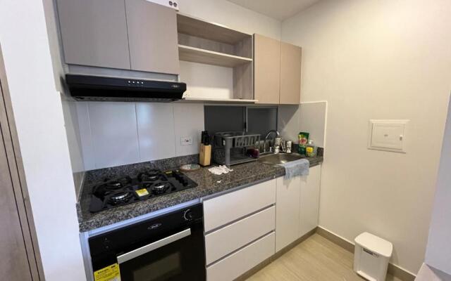Apartamento con piscina y parqueadero a 7 min del centro