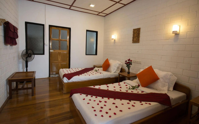 Teak Wood Hotel