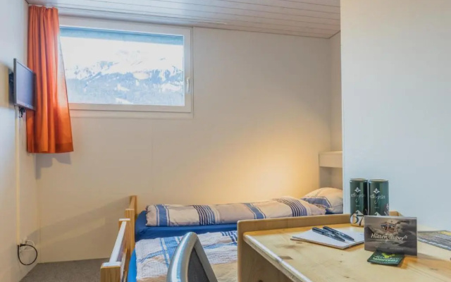 Mountain Lodge Backpackercamp – Guest Rooms – Lenk