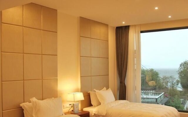 Xizhou Taoyuan No.1 Sea View Holiday Hotel