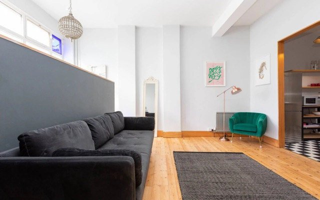 Stylish 2 Bedroom Converted Victorian Storefront