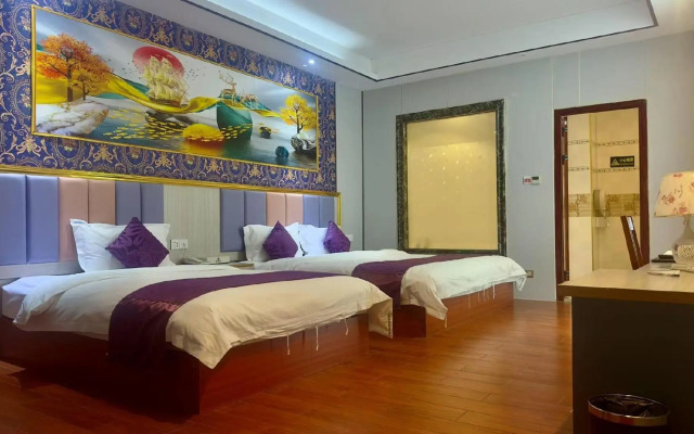 Q+ Nanxiong Xinhewan Business Hotel