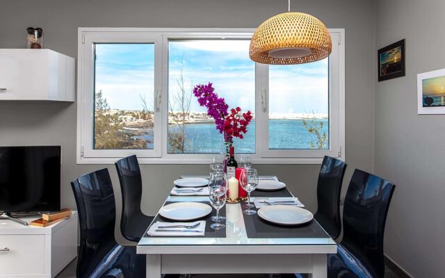Coral Bay Beachfront Apartment by Vacanzy Collection