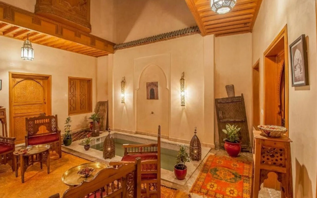 "room in Guest Room - Riad Lakouas Triple Room With Pool View"