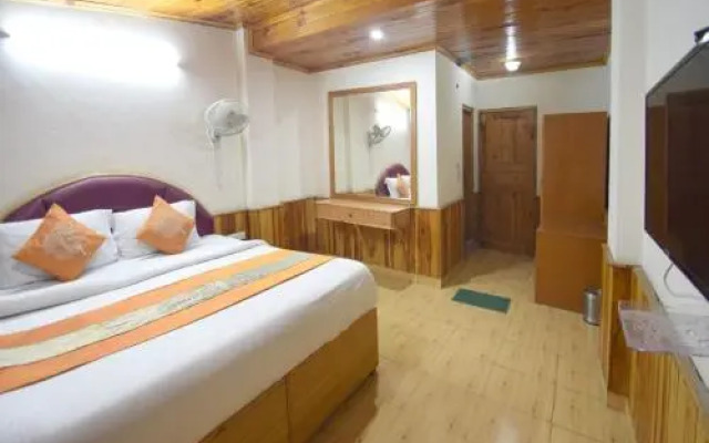 Sarthak Resort by OYO Rooms