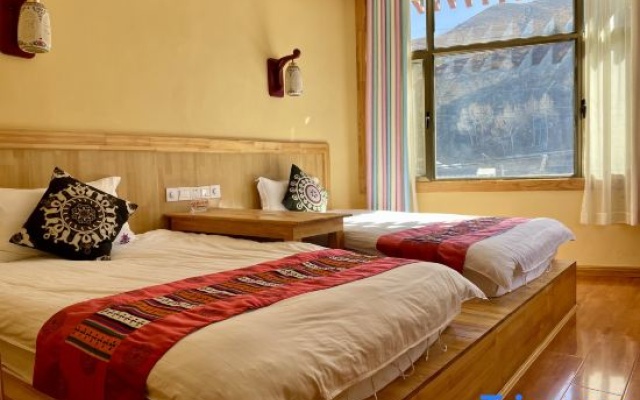 Snow Mountain Inn – Guest Rooms – Gannan