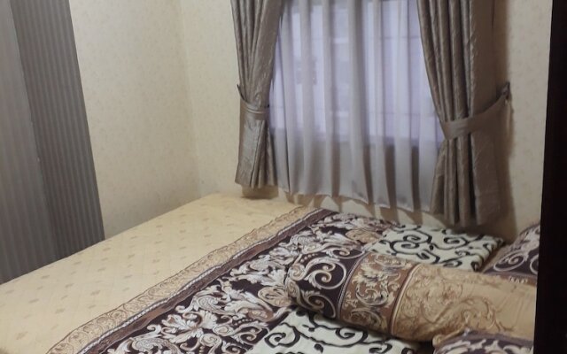 Apartment The Suites Metro by Herlan