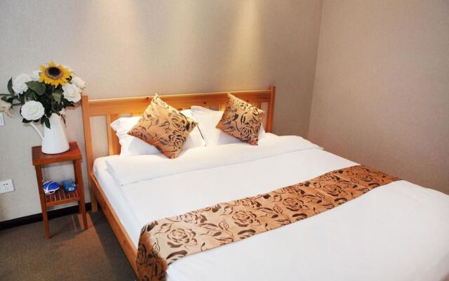 Yijia Hotel Apartment Dalian (Xinghai Daguan)