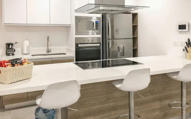 Luxe Condos Complex with Roof Pool