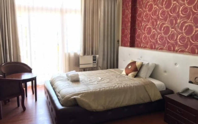 Oyo 159 San Remigio Pensionne Suites