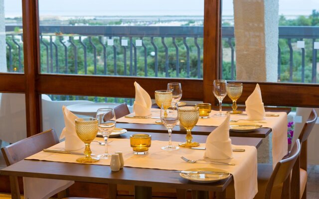 Ozadi Tavira Hotel