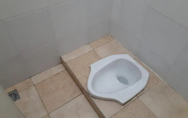 Spot On 3988 Kost Carmelia Baranangsiang Syariah