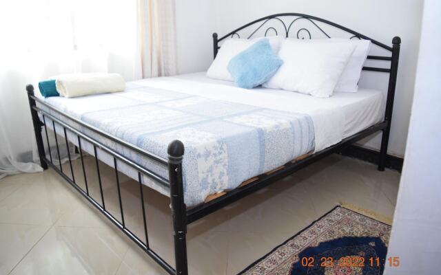 Dar es Salaam-sleeps8-parking-garden-pet Friendly
