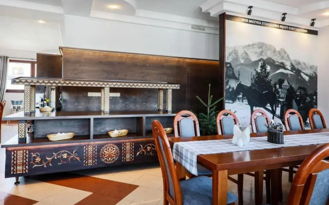 Folk Resort Domki i Apartamenty