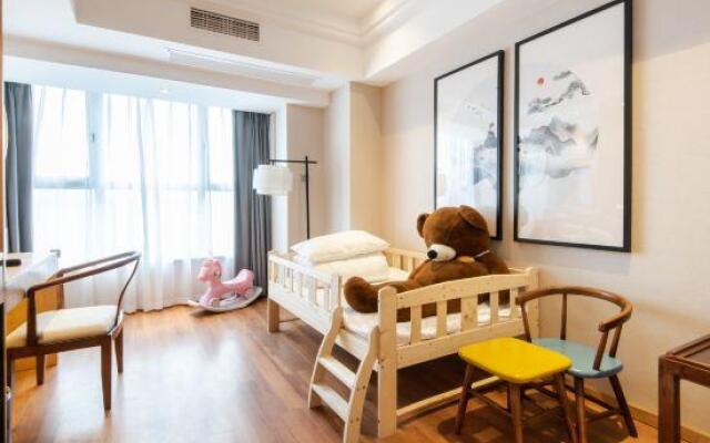 Charm City Kai Guan Hotel (Chengdu West Railway Station Qingyang Wanda)