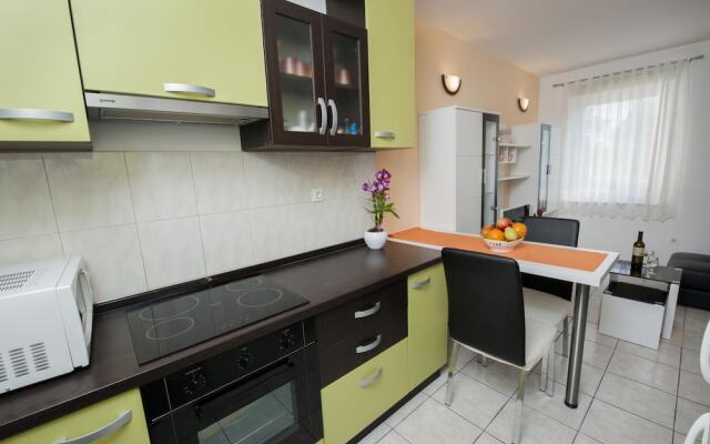 Apartment Tomy / Studio A2