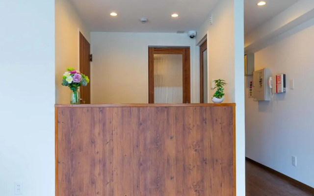 Mr.KINJO in front of Manza Beach