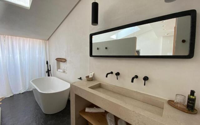 S Estancia Suites