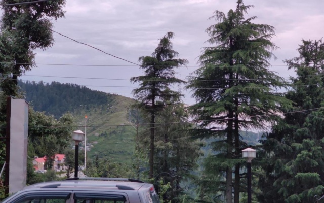 Pax Grace Mount Inn & Suites